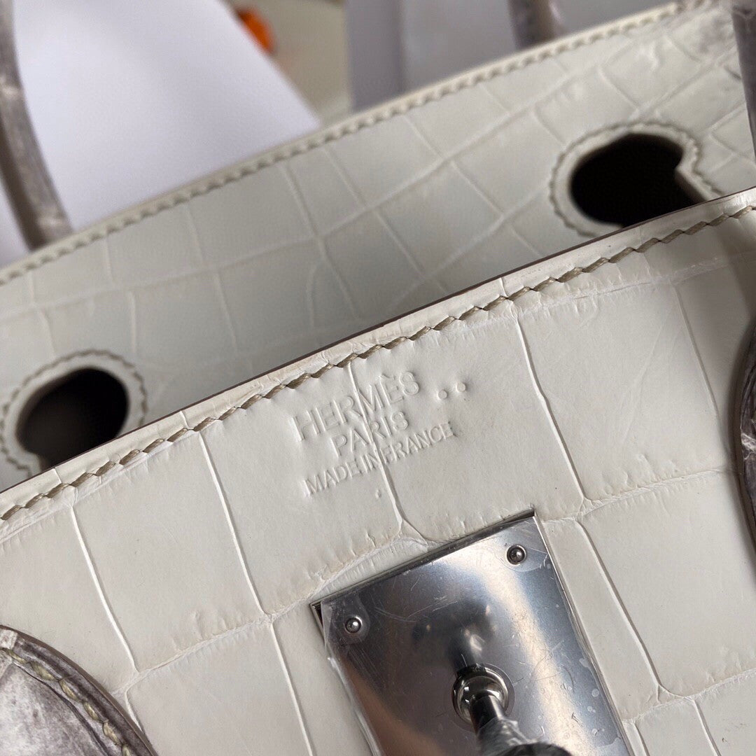 Hermes Matte Himalayan Crocodile Niloticus Birkin bag with 18-karat white gold and diamond
