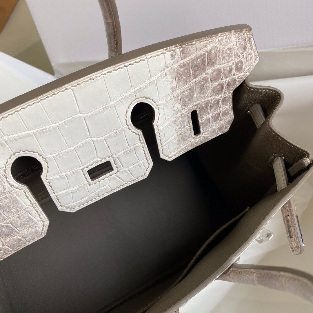 Hermes Matte Himalayan Crocodile Niloticus Birkin bag with 18-karat white gold and diamond