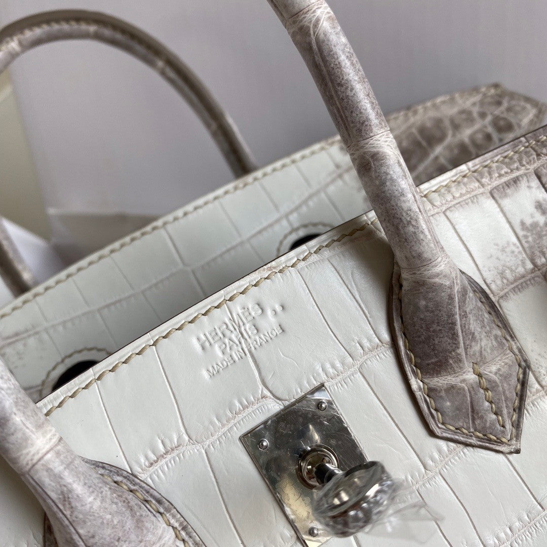 Hermes Matte Himalayan Crocodile Niloticus Birkin bag with 18-karat white gold and diamond