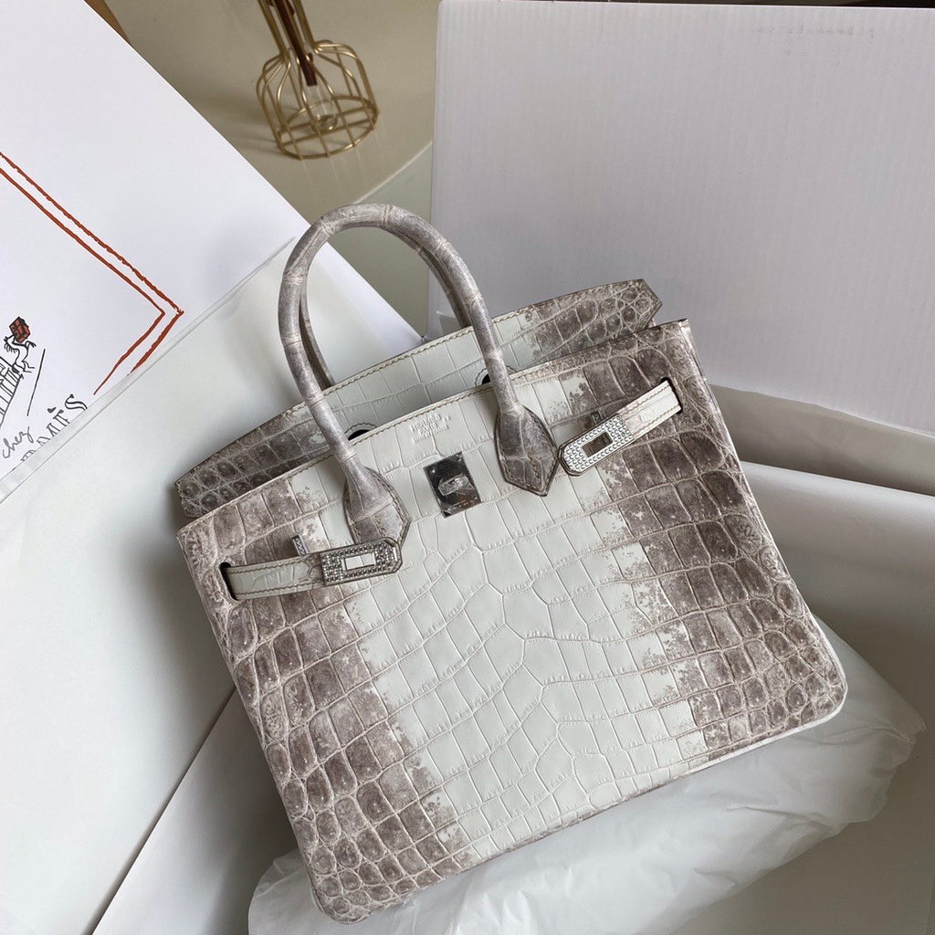 Hermes Matte Himalayan Crocodile Niloticus Birkin bag with 18-karat white gold and diamond