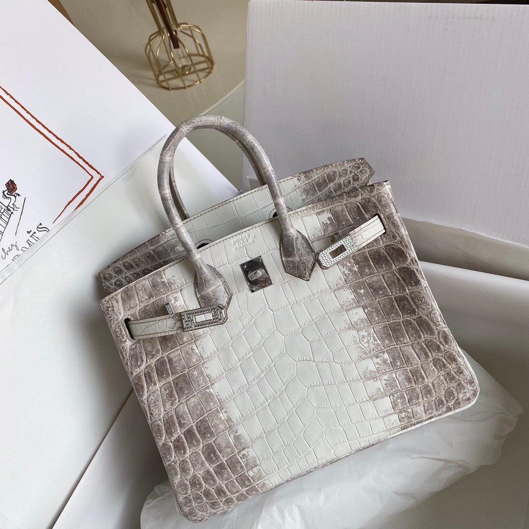 Hermes Matte Himalayan Crocodile Niloticus Birkin bag with 18-karat white gold and diamond