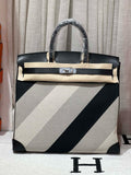 HERMÈS Limited Edition Haut à Courroies 40 HAC handbag in Black and White Evercolor leather and Toile H Canvas with Palladium hardware Hermes