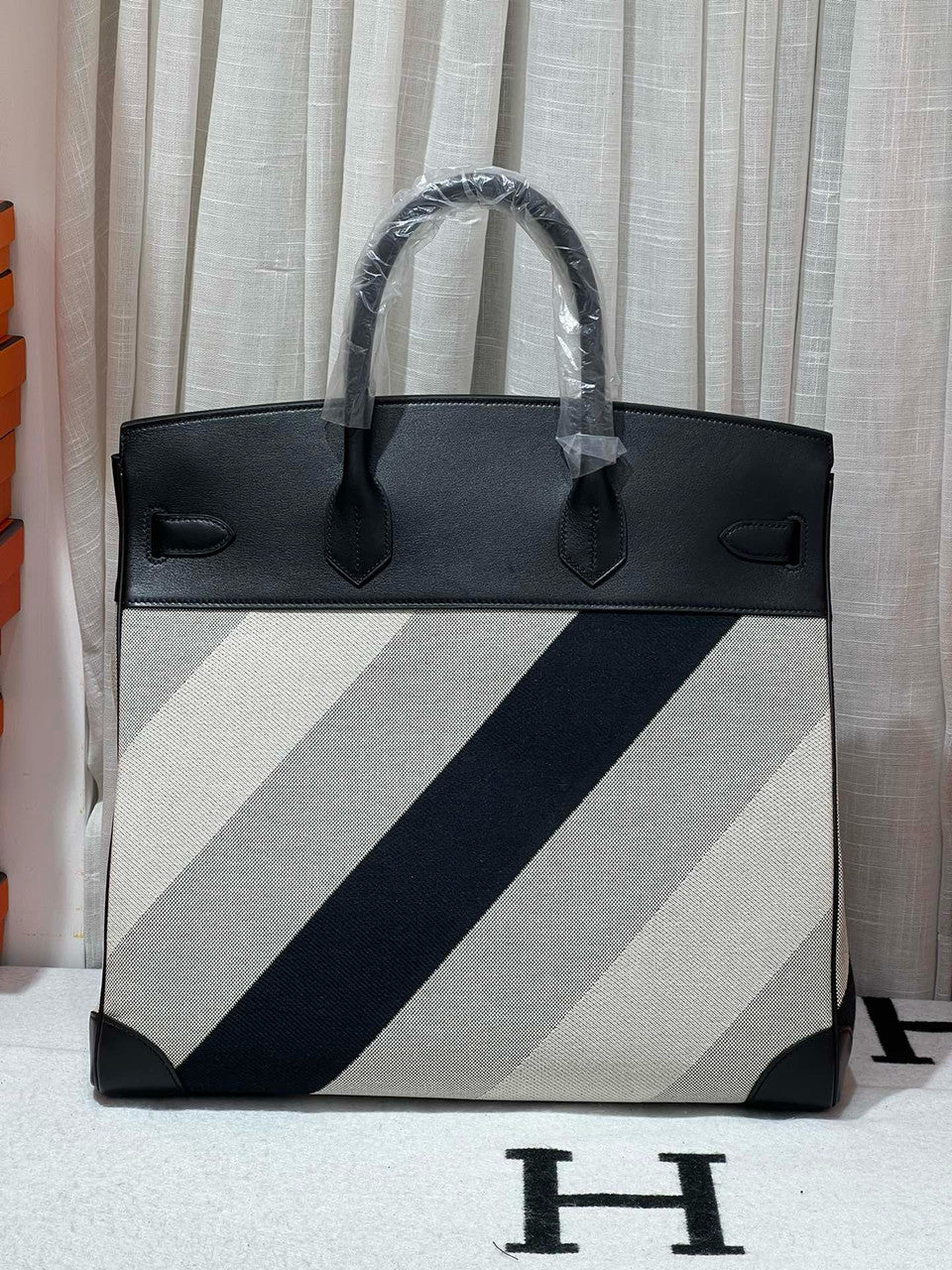 HERMÈS Limited Edition Haut à Courroies 40 HAC handbag in Black and White Evercolor leather and Toile H Canvas with Palladium hardware Hermes