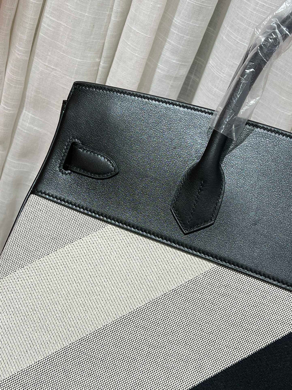 HERMÈS Limited Edition Haut à Courroies 40 HAC handbag in Black and White Evercolor leather and Toile H Canvas with Palladium hardware Hermes