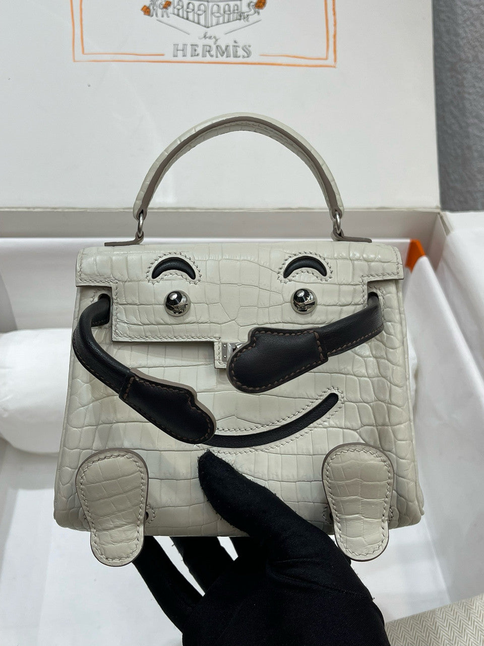 Hermes Kelly Idole (Kelly Doll) in Grey Alligator with Palladium hardware.