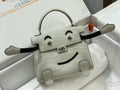 Hermes Kelly Idole (Kelly Doll) in Grey Alligator with Palladium hardware.
