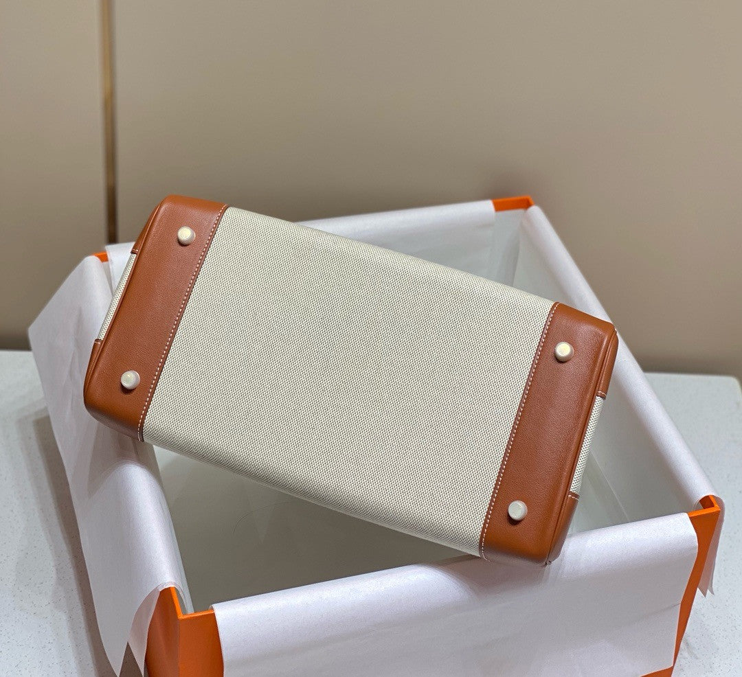 HERMÈS Toile Birkin 35 with Gold Swift Leather Hermes