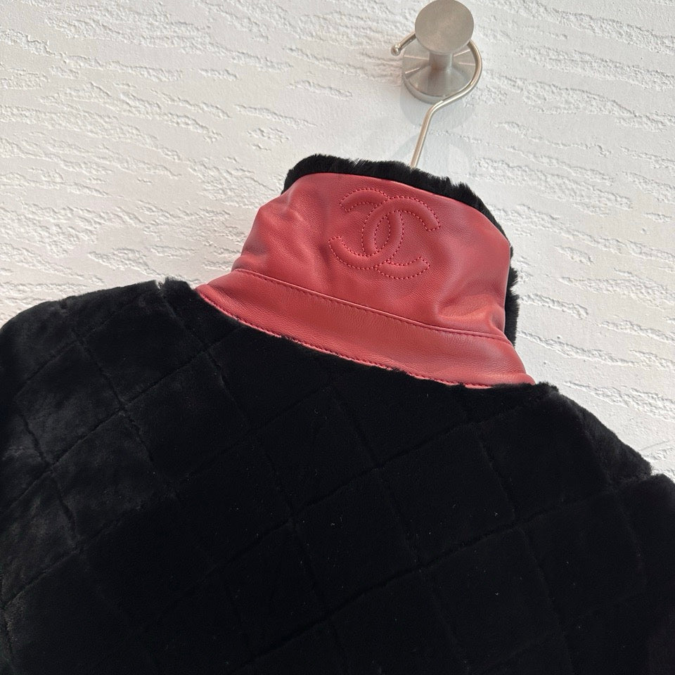 Chanel shearling bomber jacket in black — back collar CC detail