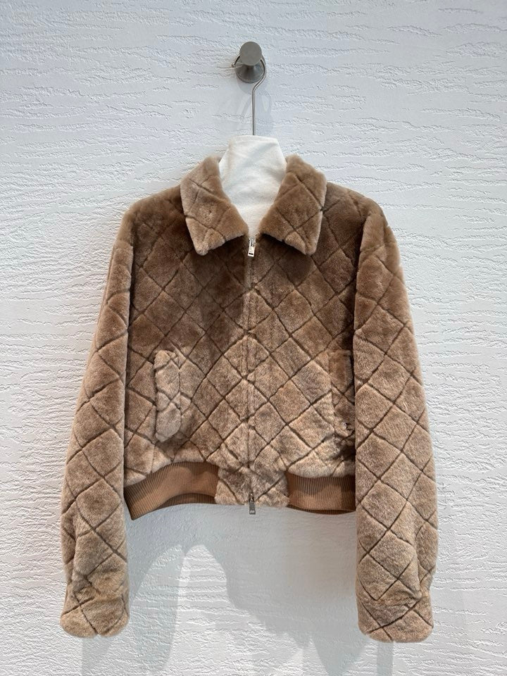Chanel shearling bomber jacket in medium camel — front view