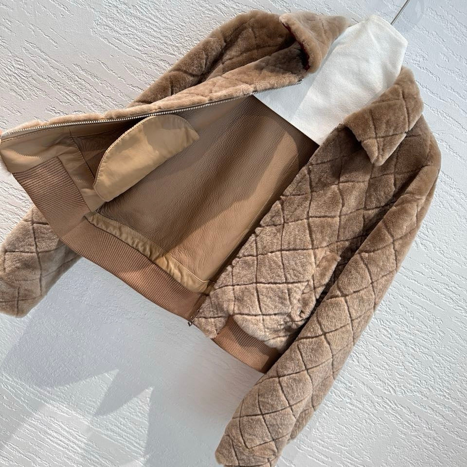Chanel shearling bomber jacket in medium camel — leather-lined interior