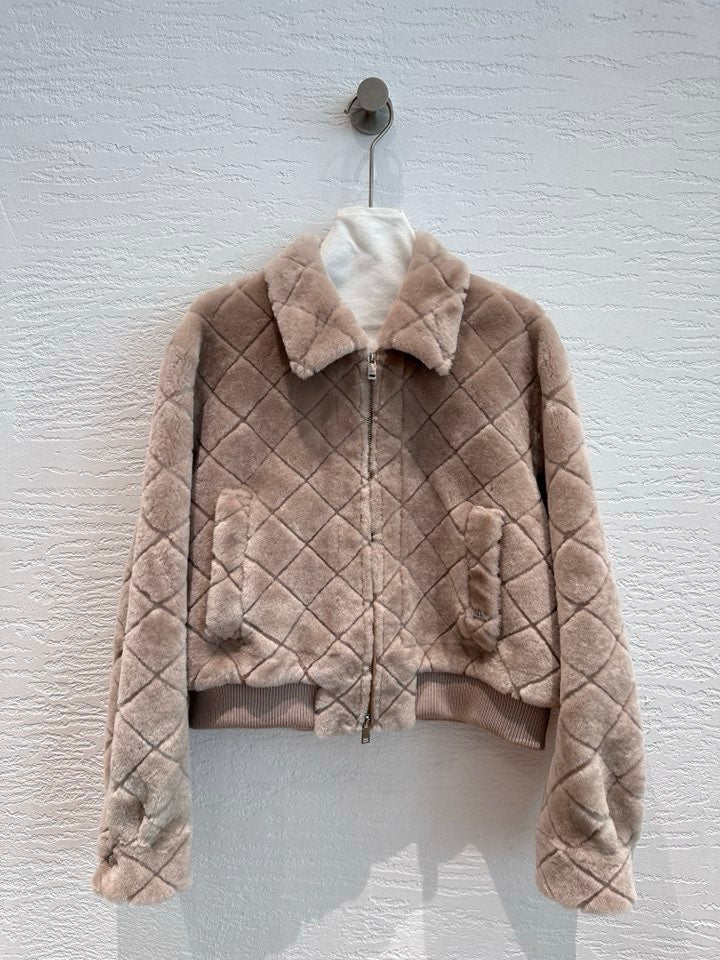 Chanel shearling bomber jacket in light beige — front view