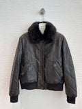 Chanel quilted leather bomber jacket in black, front view