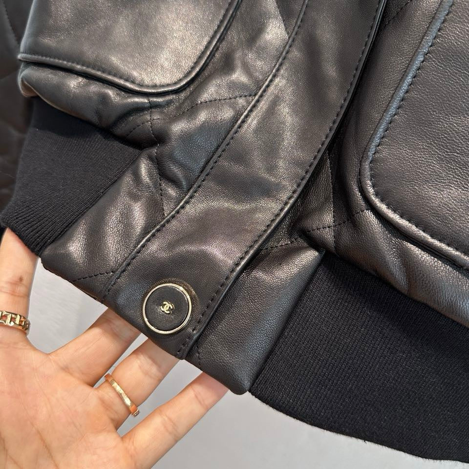 Chanel quilted leather bomber jacket CC logo button detail
