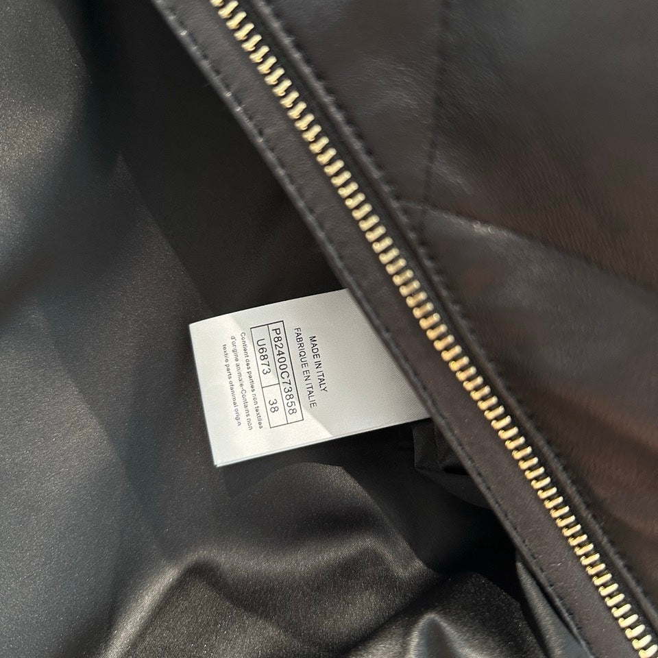 Chanel quilted leather bomber jacket interior label, black colourway