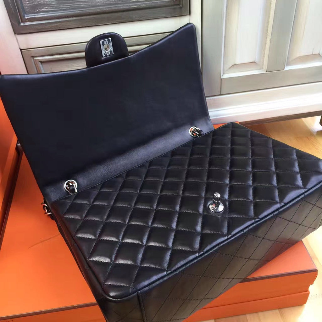Chanel Black Quilted Lambskin Maxi Classic Double Flap Bag
