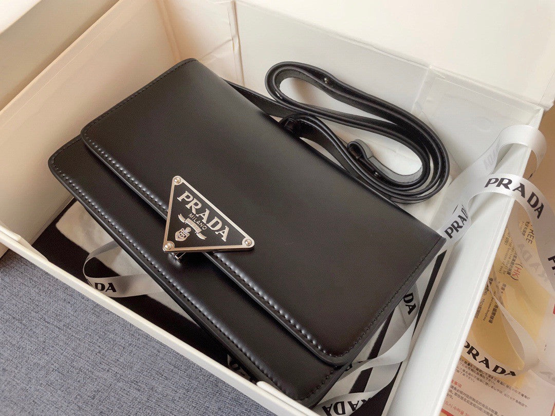 Prada Emblème brushed-leather bag Black