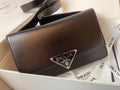 Prada Emblème brushed-leather bag Black