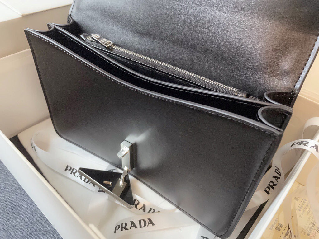 Prada Emblème brushed-leather bag Black