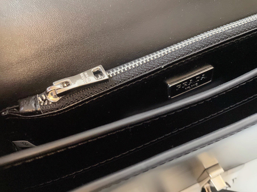 Prada Emblème brushed-leather bag Black
