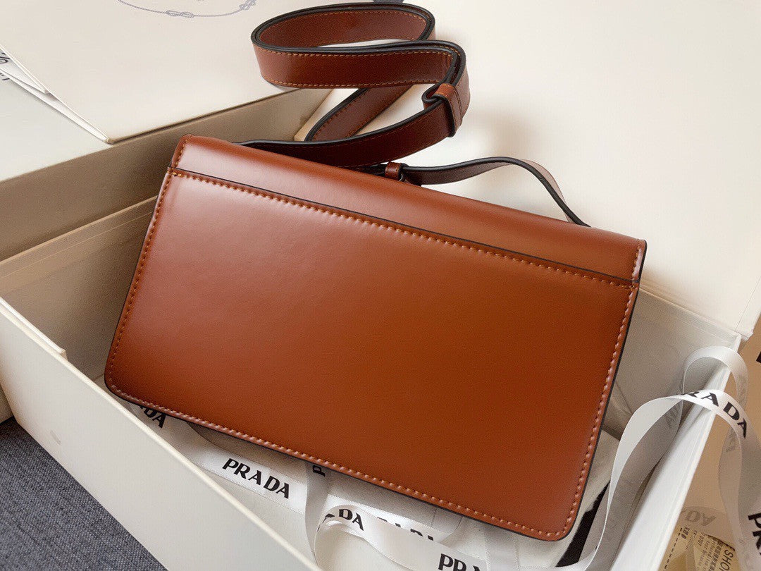 Prada Emblème brushed-leather bag Tabacco