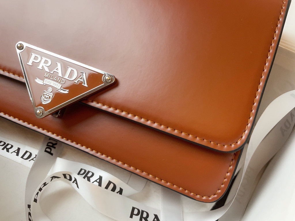Prada Emblème brushed-leather bag Tabacco