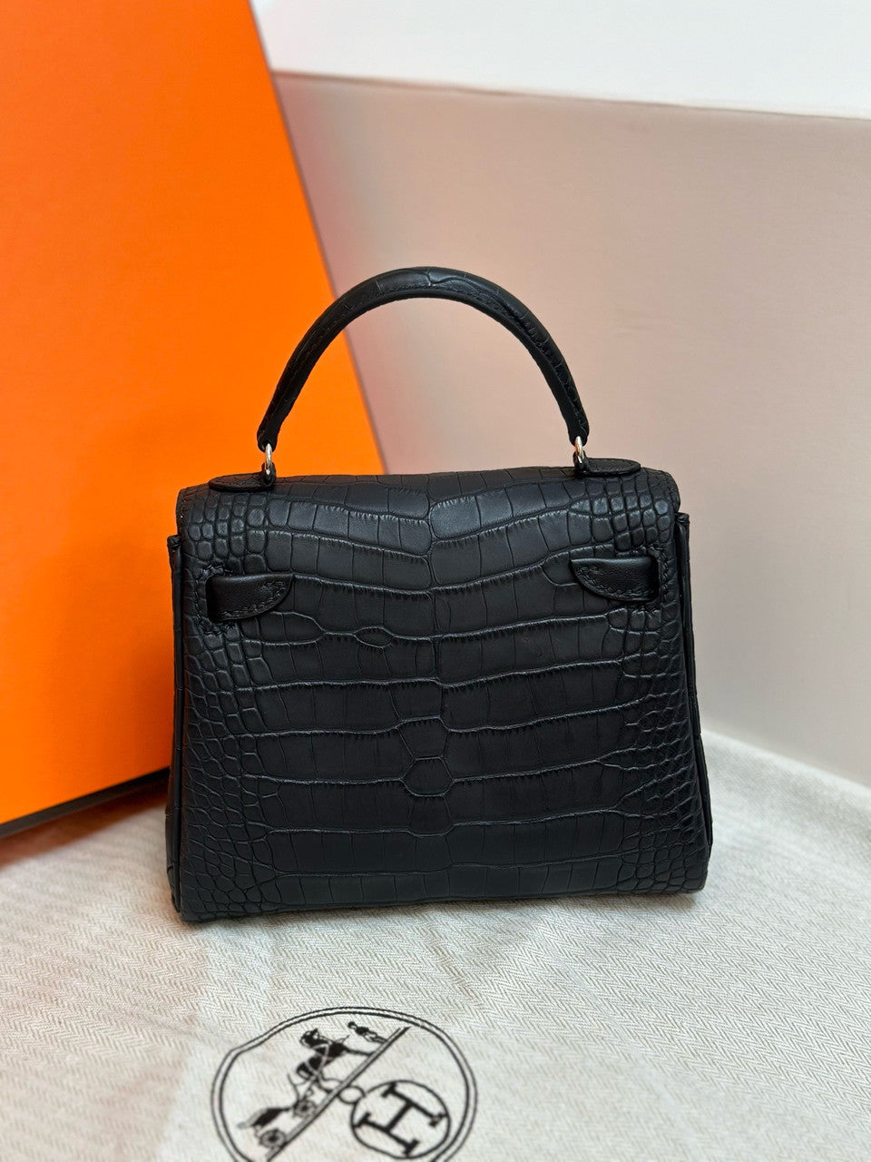 Hermes Kelly Idole (Kelly Doll) in Black Alligator with Palladium hardware. Hermes