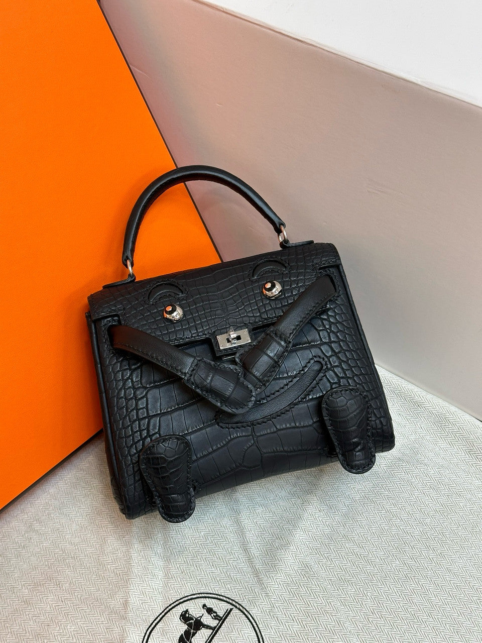 Hermes Kelly Idole (Kelly Doll) in Black Alligator with Palladium hardware. Hermes