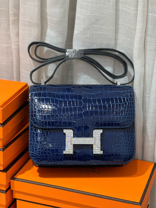 HERMES SHINY BLEU ÉLECTRIQUE POROSUS CROCODILE MINI CONSTANCE 18 WITH 18K WHITE GOLD & DIAMOND HARDWARE