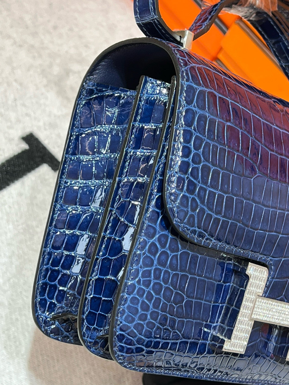 HERMES SHINY BLEU ÉLECTRIQUE POROSUS CROCODILE MINI CONSTANCE 18 WITH 18K WHITE GOLD & DIAMOND HARDWARE