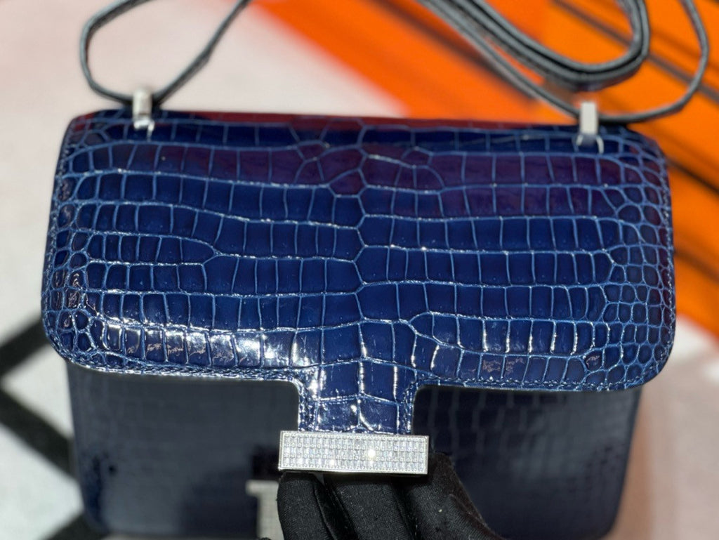HERMES SHINY BLEU ÉLECTRIQUE POROSUS CROCODILE MINI CONSTANCE 18 WITH 18K WHITE GOLD & DIAMOND HARDWARE