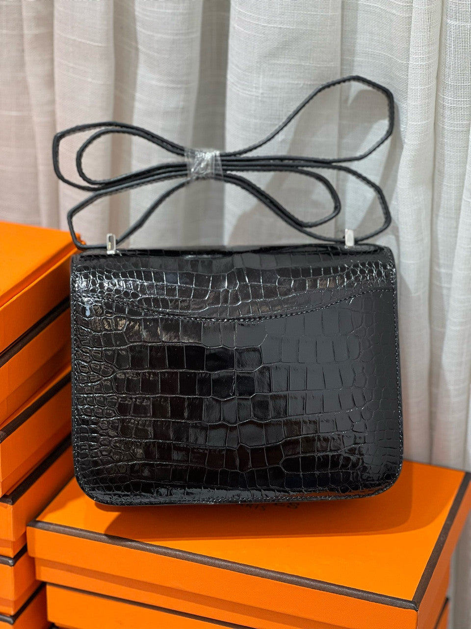 HERMES SHINY BLACK POROSUS CROCODILE MINI CONSTANCE 18 WITH 18K WHITE GOLD & DIAMOND HARDWARE