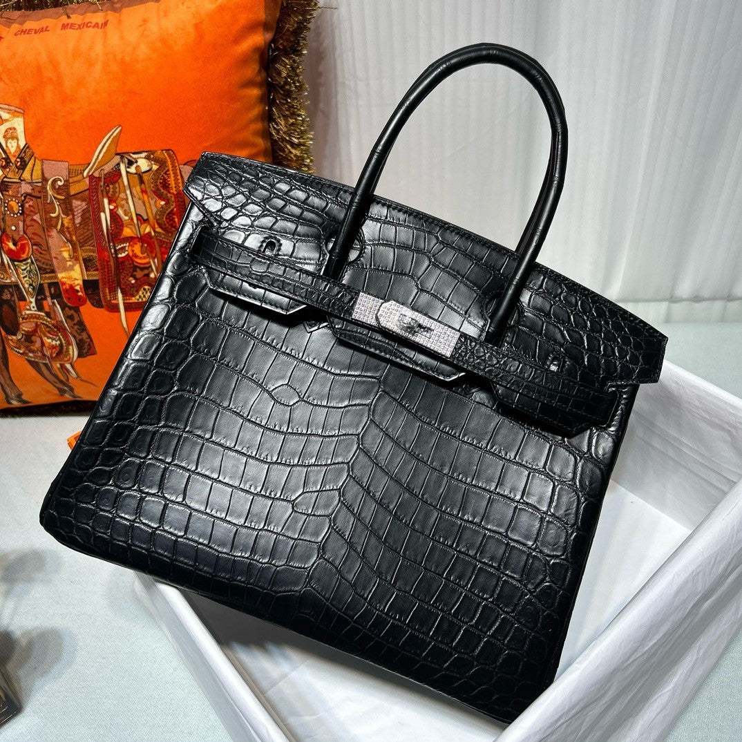HERMES SHINY BLACK POROSUS CROCODILE DIAMOND BIRKIN 30 WITH 18K WHITE GOLD & DIAMOND HARDWARE