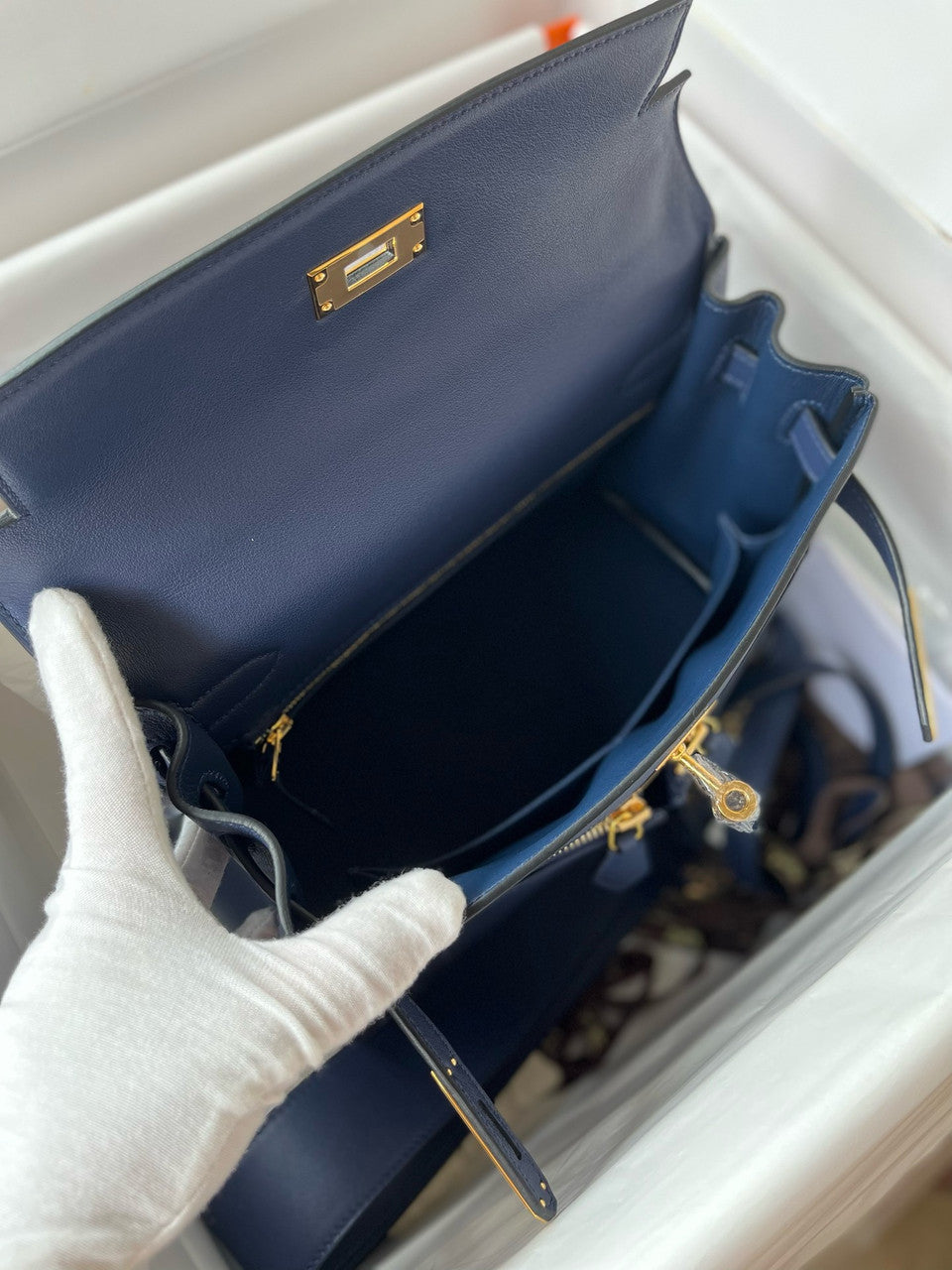 Hermes LIMITED EDITION Blue Sapphire SWIFT LEATHER LAKIS KELLY 28 WITH GOLD HARDWARE