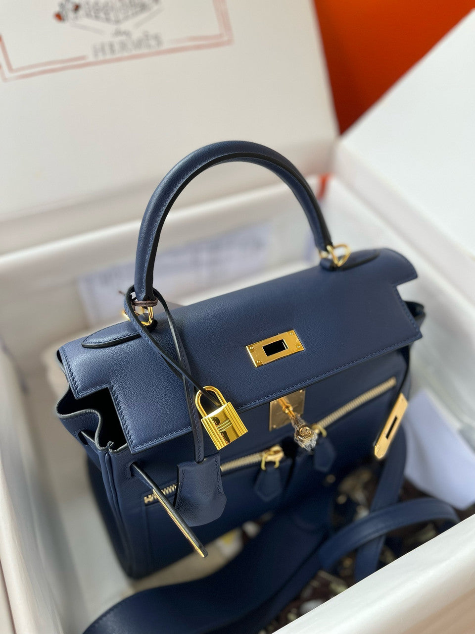 Hermes LIMITED EDITION Blue Sapphire SWIFT LEATHER LAKIS KELLY 28 WITH GOLD HARDWARE