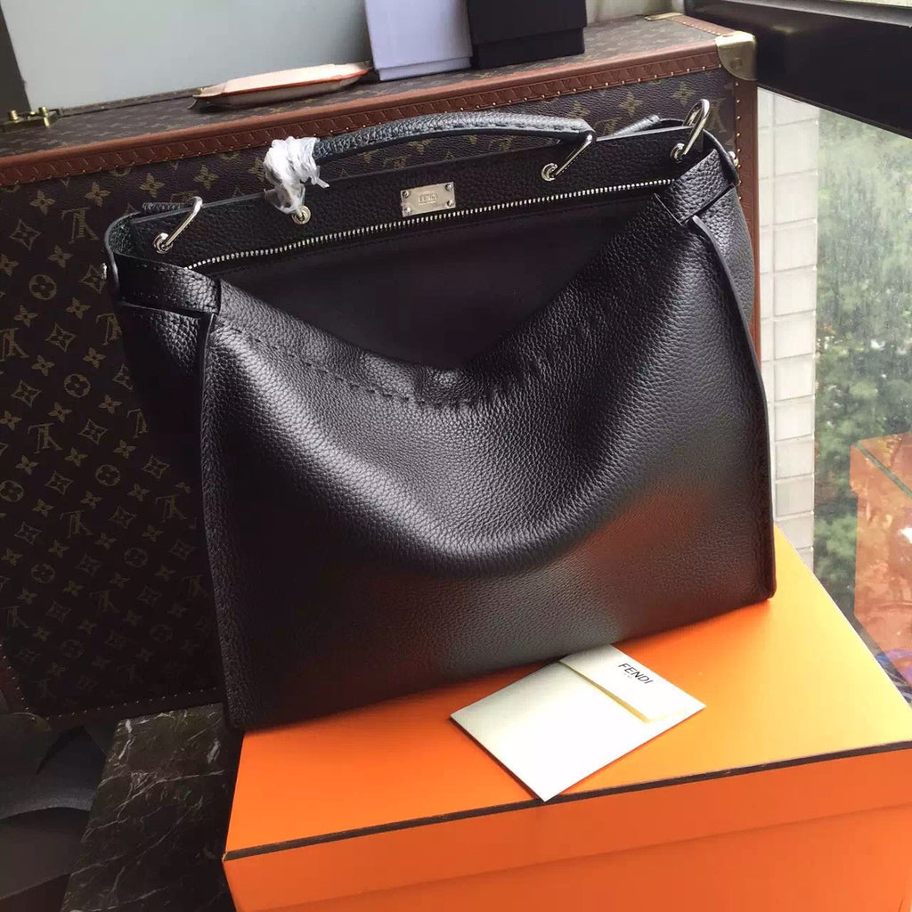 Fendi SELLERIA PEEKABOO for Man Luxinvest Ltd