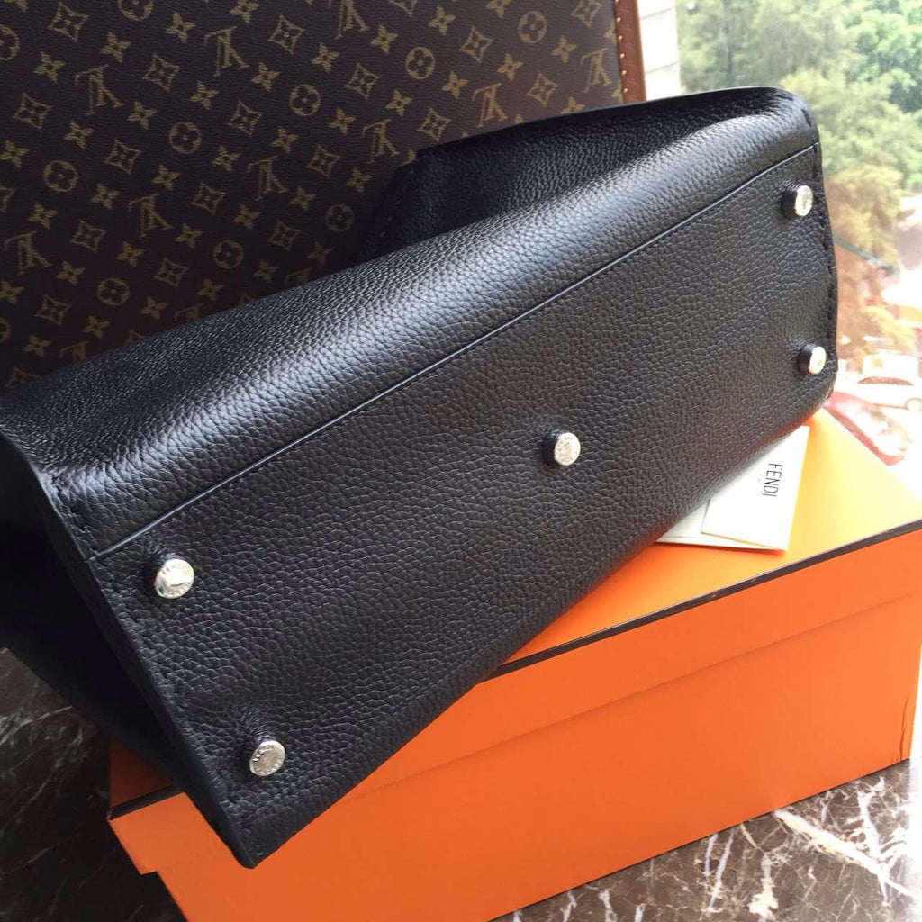 Fendi SELLERIA PEEKABOO for Man Luxinvest Ltd