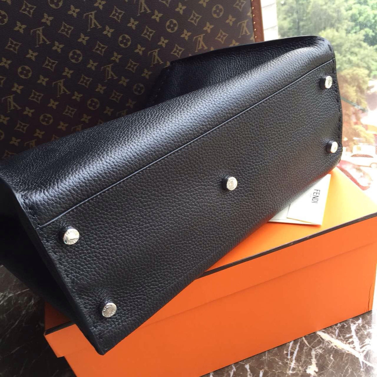 Fendi SELLERIA PEEKABOO for Man Luxinvest Ltd