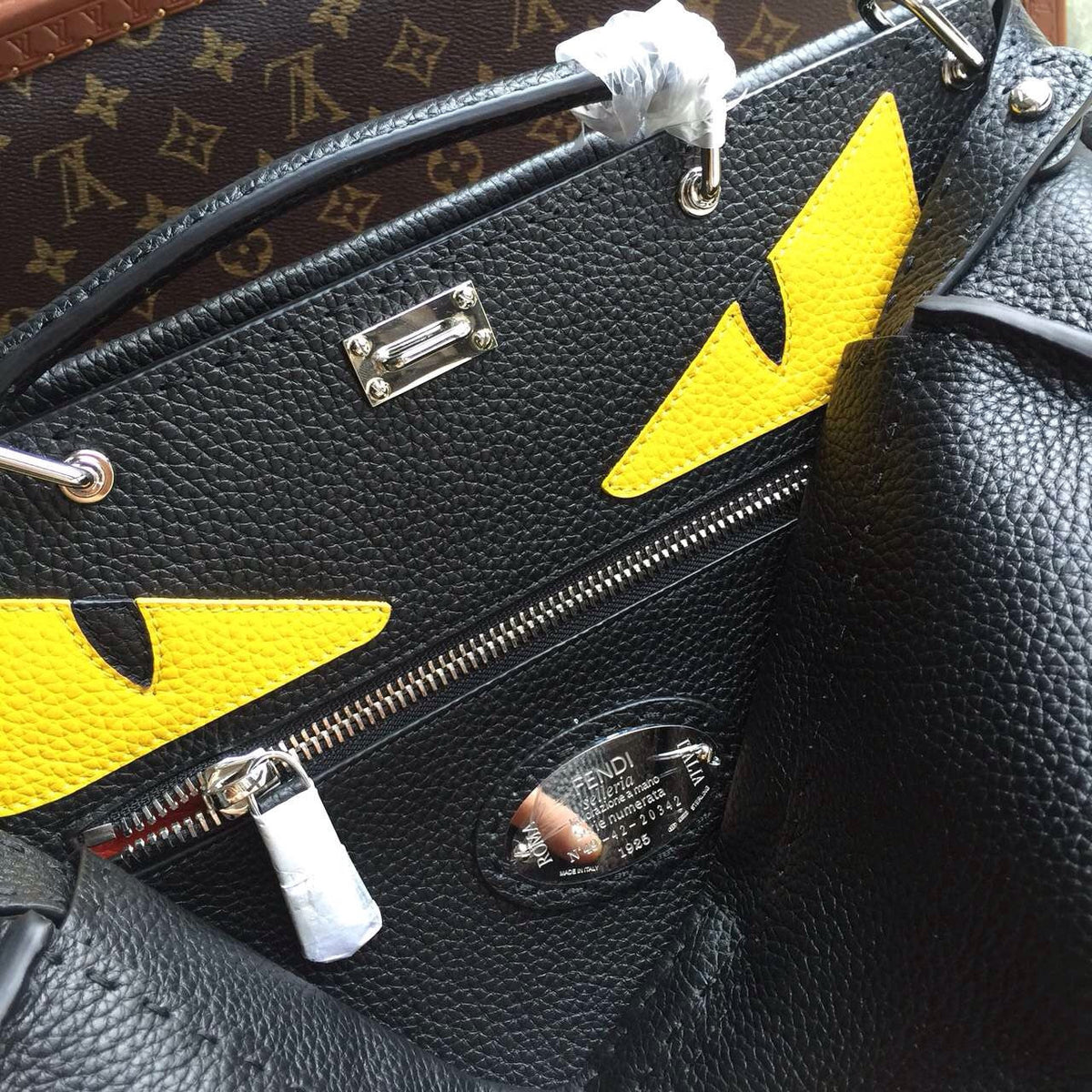 Fendi SELLERIA PEEKABOO for Man Luxinvest Ltd