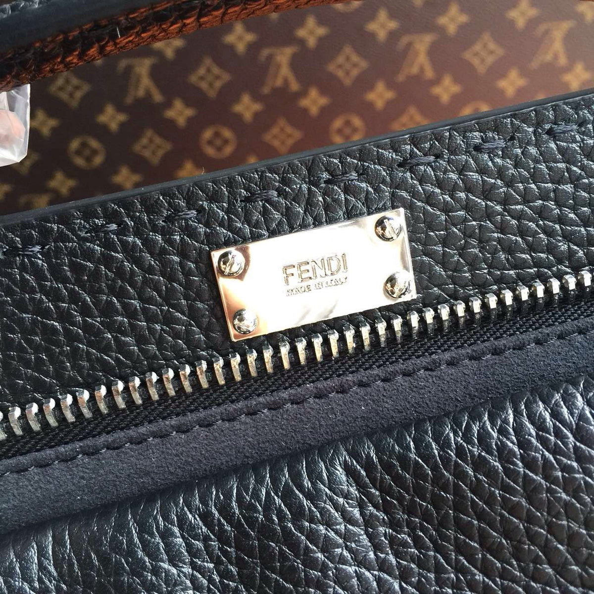 Fendi SELLERIA PEEKABOO for Man Luxinvest Ltd