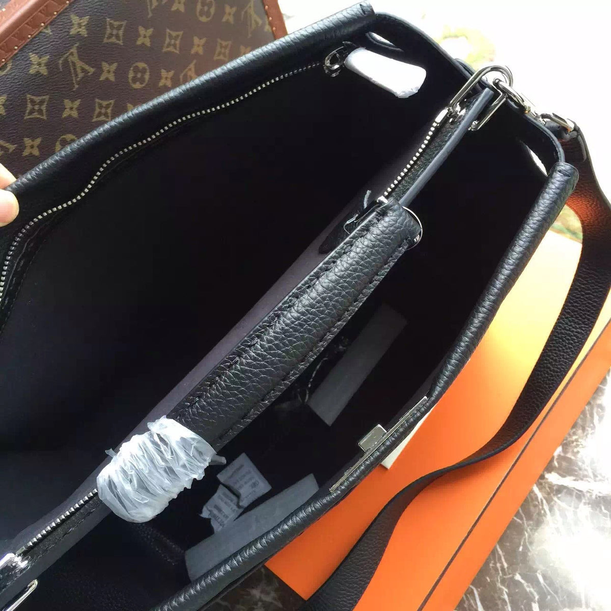 Fendi SELLERIA PEEKABOO for Man Luxinvest Ltd