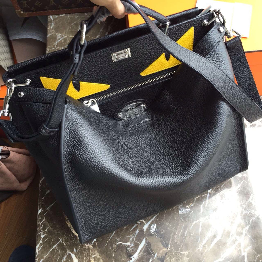Fendi SELLERIA PEEKABOO for Man Luxinvest Ltd