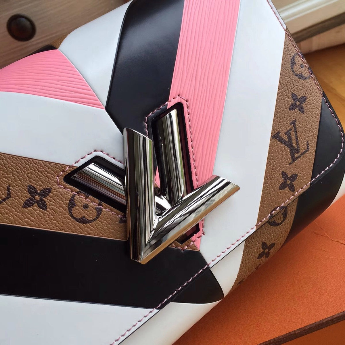 Louis Vuitton  White/Pink/Black and monogram Reverse Twist Bag  Limited Edition