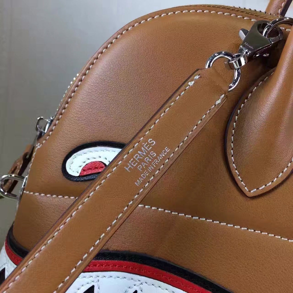 Hermes limited edition Gold Togo Leather Shark Bolide 45 with palladium hardware