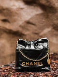 CHANEL 22 MINI HANDBAG GOLD LOGO BLACK SS2023 BLACK