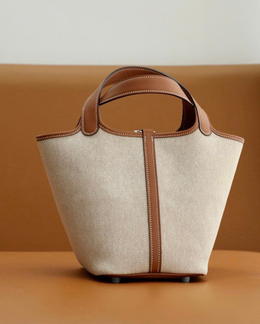 HERMES Toile Swift Picotin 18 PM Gold