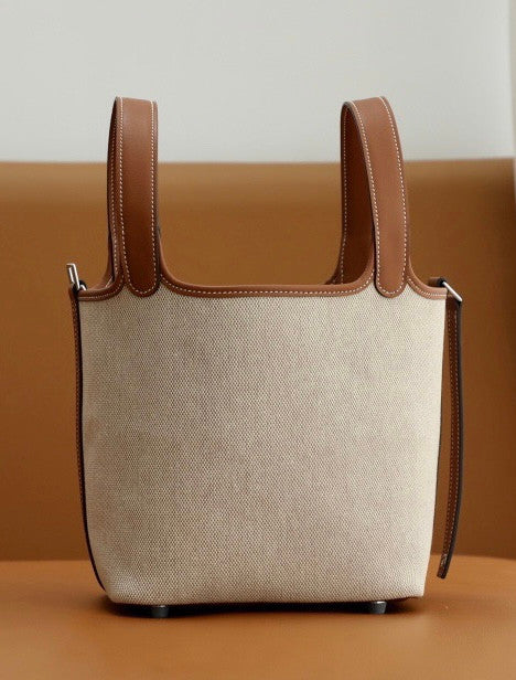 HERMES Toile Swift Picotin 18 PM Gold