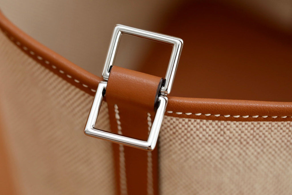 HERMES Toile Swift Picotin 18 PM Gold