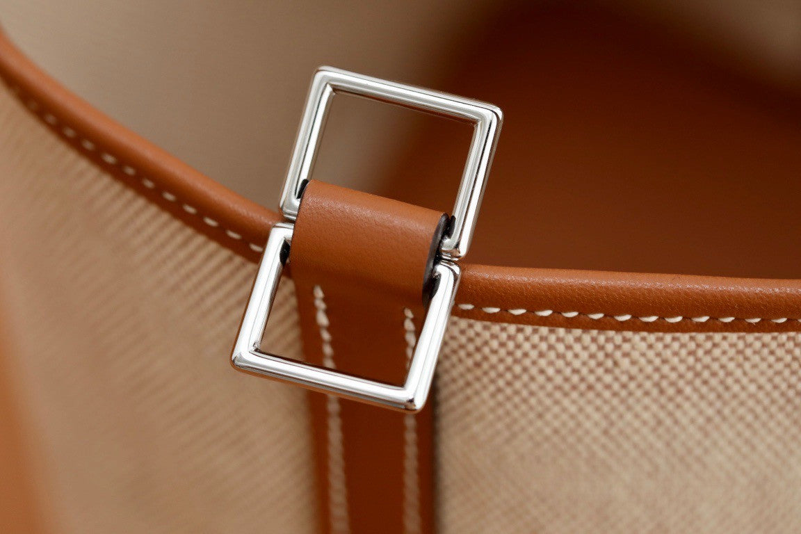 HERMES Toile Swift Picotin 18 PM Gold