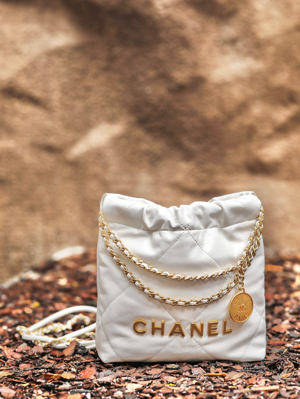 CHANEL 22 MINI HANDBAG GOLD LOGO SS2023 WHITE