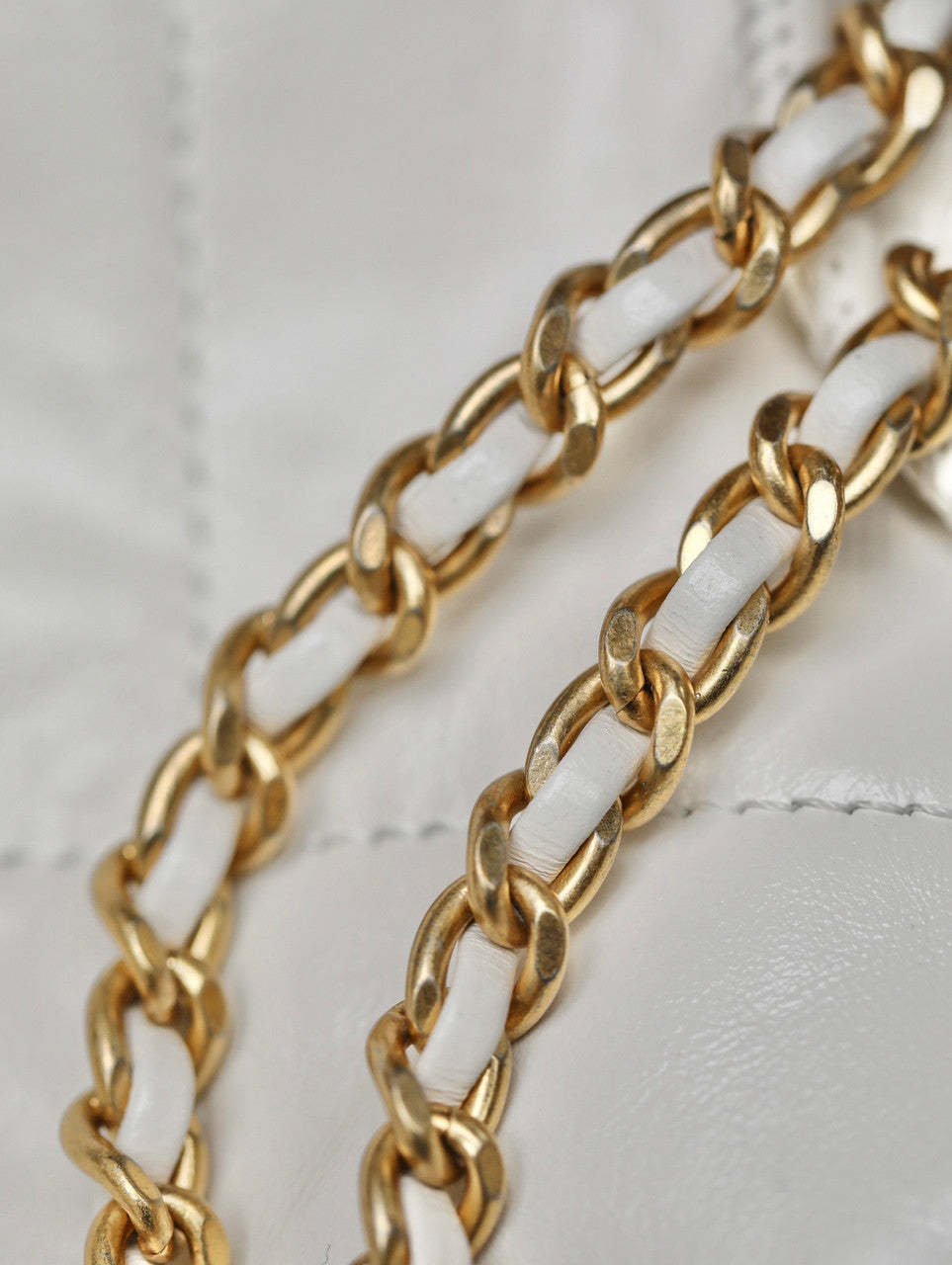 CHANEL 22 MINI HANDBAG GOLD LOGO SS2023 WHITE
